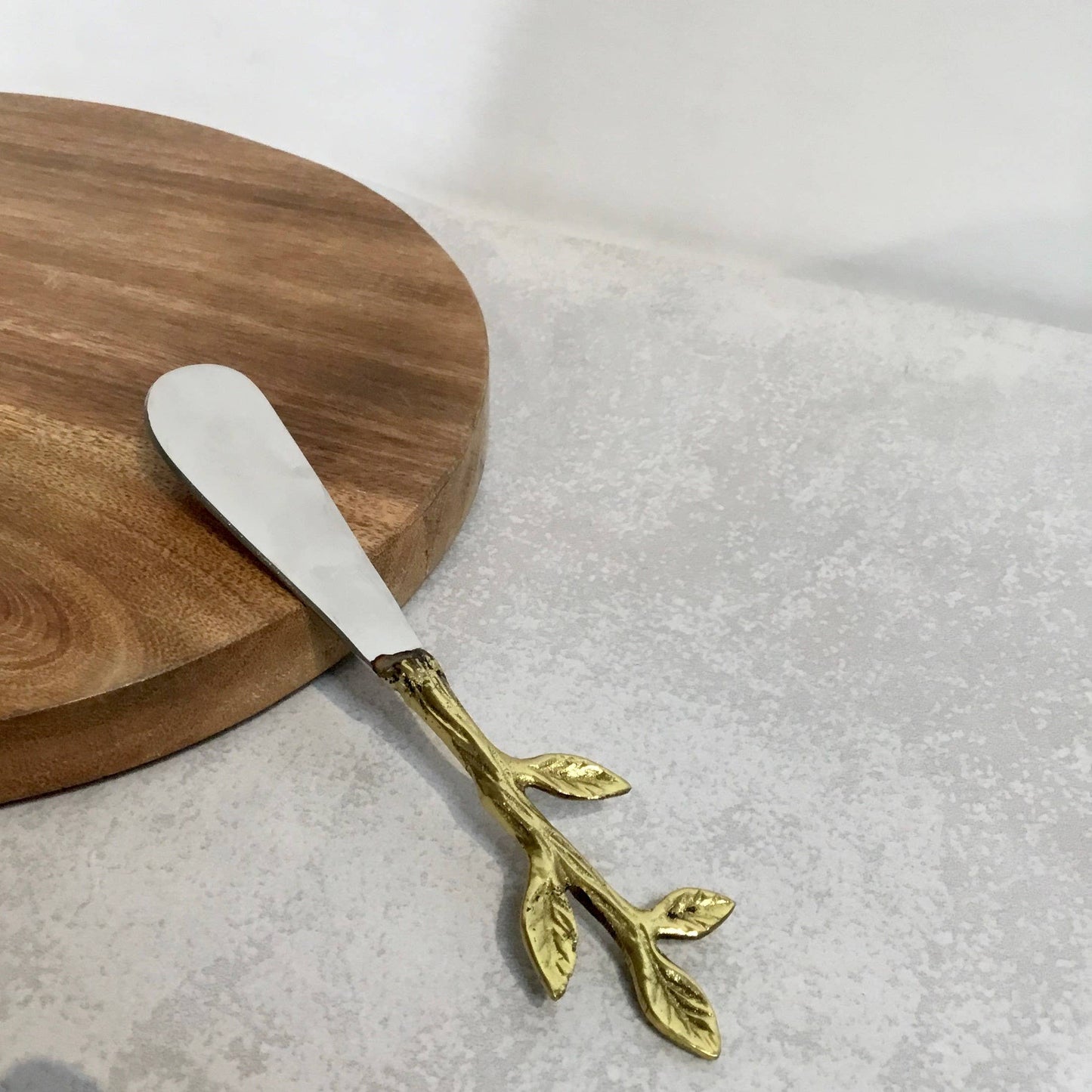 S.S. & Gold Leaf Bud Handle Spreader