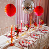 Pair of Orange Glass Candlesticks