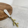 S.S. & Gold Leaf Bud Handle Spreader